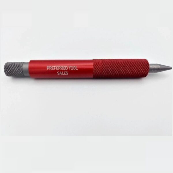 A red pen with a gray tip on top of it.