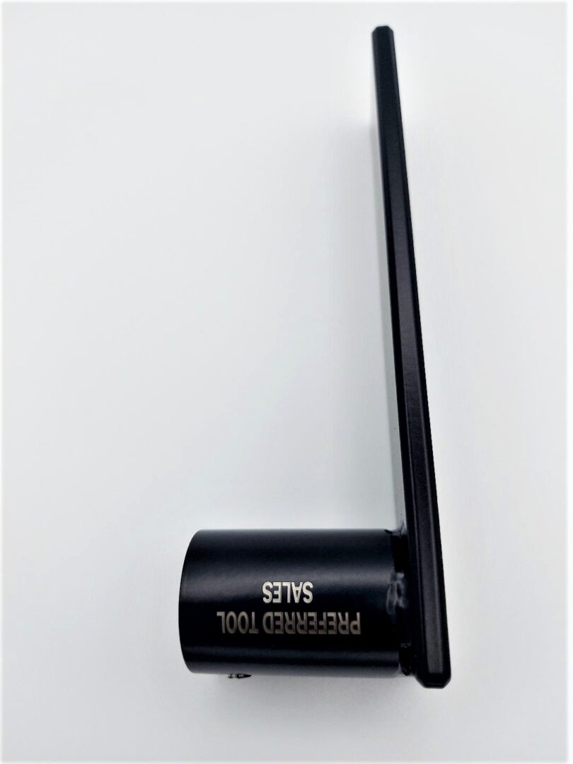 A black and gold wireless antenna on the wall.