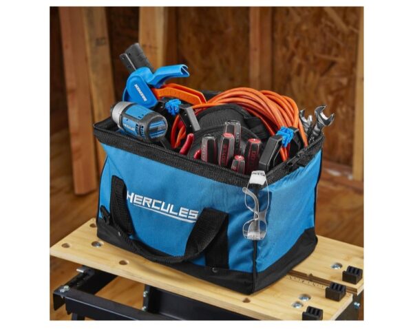 A blue bag filled with tools and equipment on top of a table.